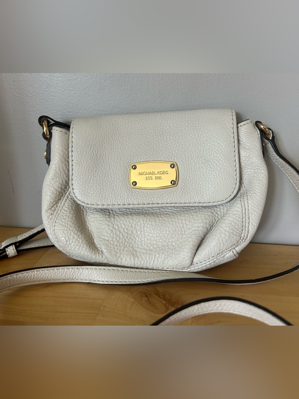 Michael Kors Off-White Pebbled Leather Crossbody with Gold Plaque